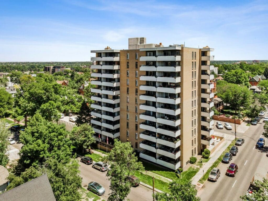 Iconic Apartment Tower in Denver’s Cheesman Park Trades for the First Time Mile High CRE